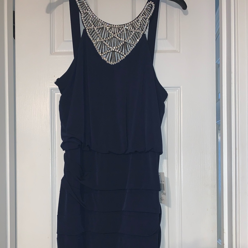 Navy blue cocktail dress with rhinestone accent